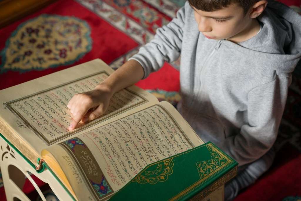 kid reading quran to answer do you need to learn arabic to learn quran